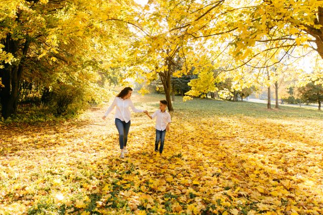 Mother and son spend time outdoors in the park